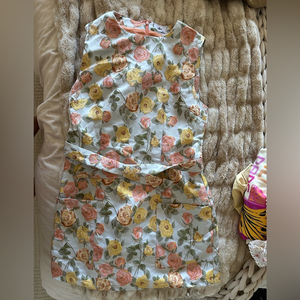 Yellow the label floral mini size M, never worn no tags
